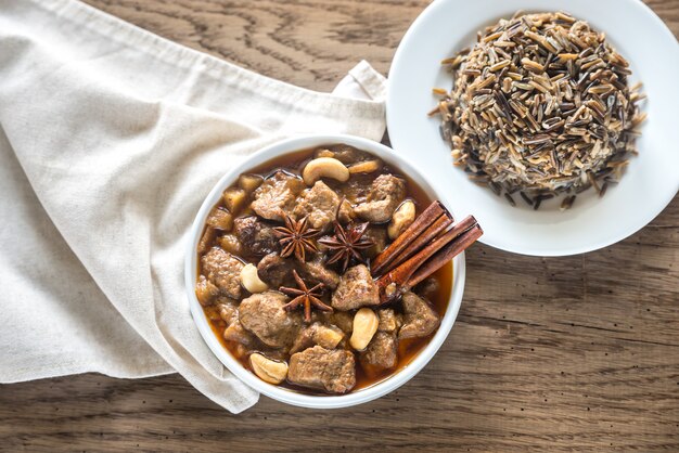 Thai Massaman Curry on the wooden background