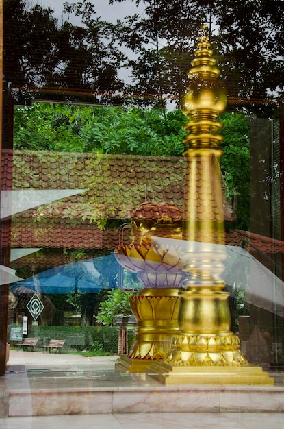 Thai people and travelers praying to protect and bring good luck with Kamphaengphet City Pillar Shrine at center city on July 18 2017 in Kamphaeng Phet Thailand