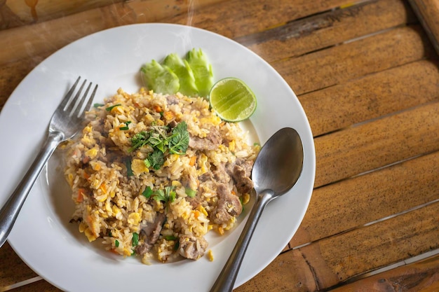 Thai pork fried rice in a white plate