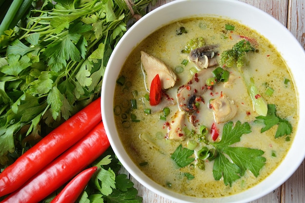 Thai  Spicy Green curry chicken soup  with coconut milk, mushrooms and broccoli.