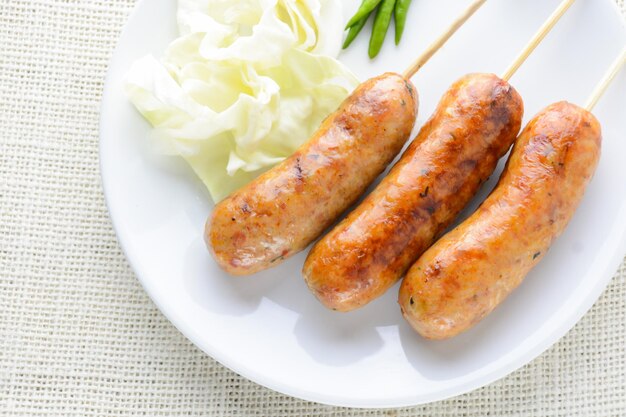 Thai Spicy Sausages made from minced pork mixed with a variety of ingredients which makes it packed with flavour and gives it a unique scent