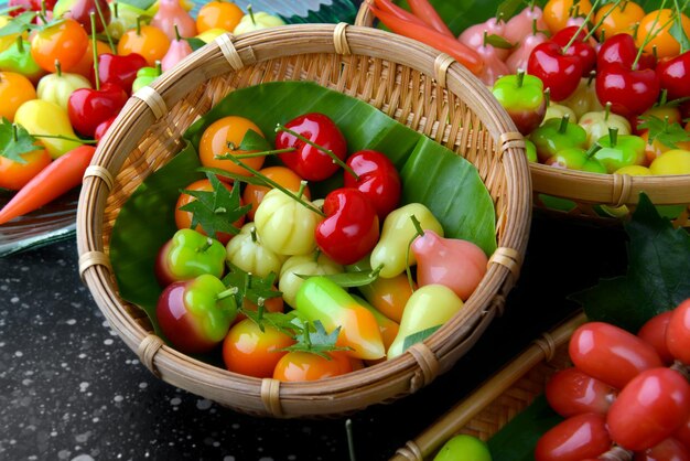 Thai style Fruit shape dessert setting with studio lighting.