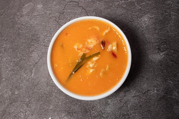 Thai Thick Soup with prawn shrimp and chicken served in bowl isolated on background top view of bangladesh food