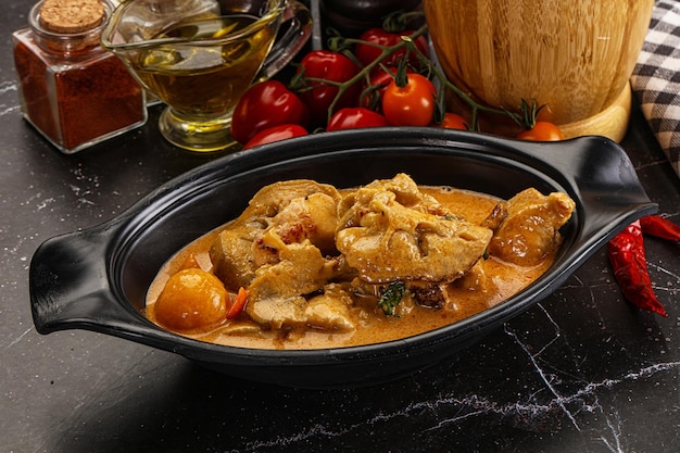 thai tom yum soup with chicken