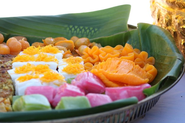 Thai traditional dessert serving on banana leaf