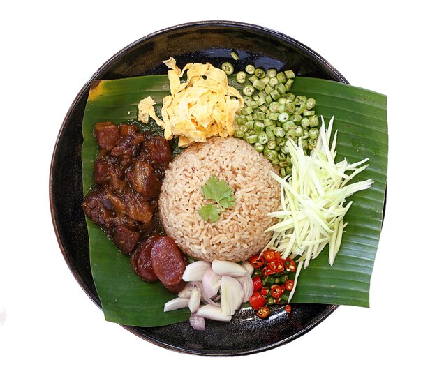 Thai traditional food Rice seasoned with shrimp paste isolated on white