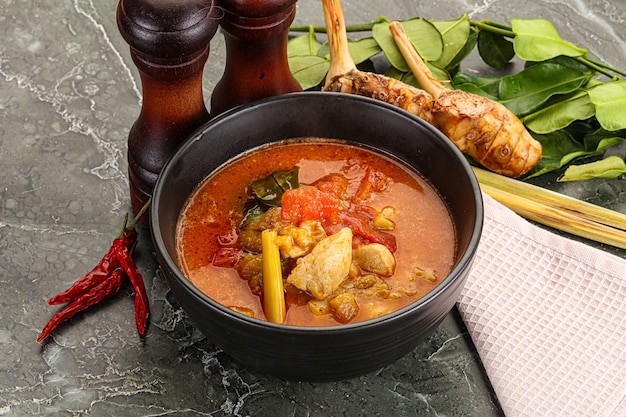 Thai traditional Tom Yum spicy soup with chicken