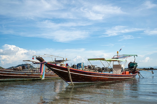 Thai traditional wooden longtail boat and beautiful sand  Beach . Thailand.