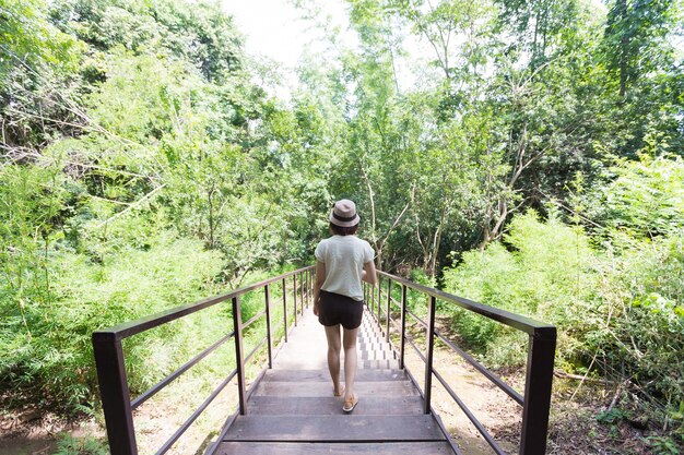 Thai woman walking on the bridge