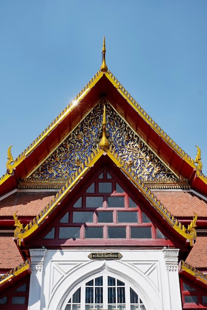 Thailand, Bangkok, golden ornaments on the roof of a buddhist temple, Amarintharam Worawihan Temple