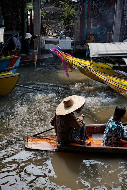 Thailand, Bangkok, wooden Thai boats at the Floating Market