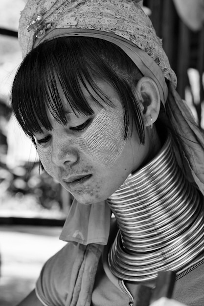 Thailand, Chang Mai, Karen Long Neck hill tribe village (Kayan Lahwi), Long Neck woman in traditional costumes. Women put brass rings on their neck when they are 5 or 6 years old and increase the numb