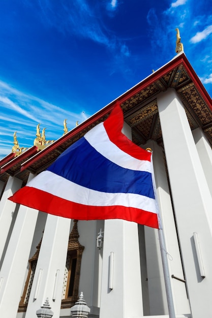 Thailand flag and Buddhist temple
