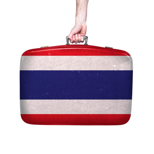 Thailand flag on a vintage leather suitcase