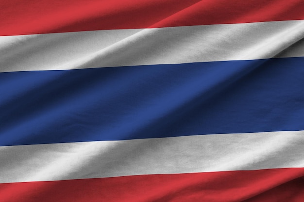 Thailand flag with big folds waving close up under the studio light indoors The official symbols and colors in banner