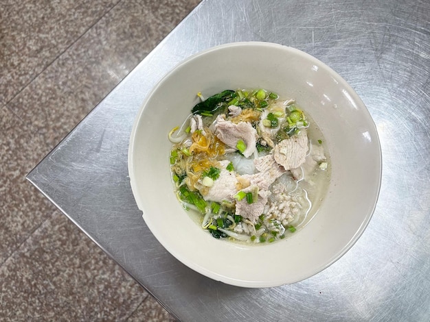 Thailand traditional noodles served with sliced pork and minced pork A popular delicious street food of Thai peoples Asian food Shot from above