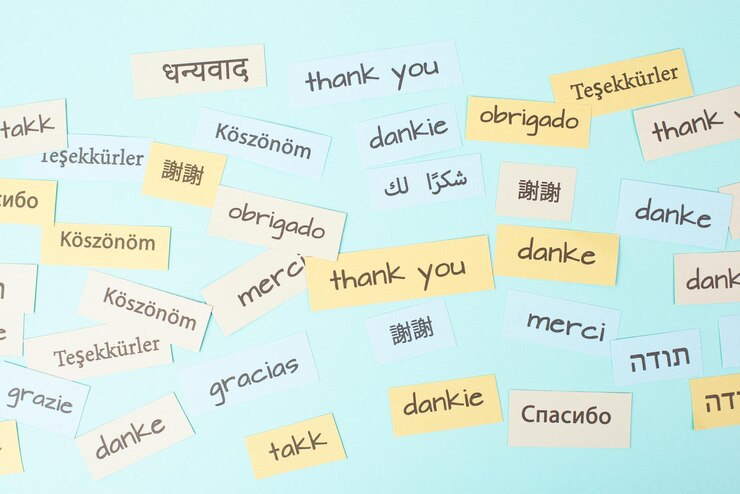 Photo thank you day word thanks in different languages being thankful support help and charity concept