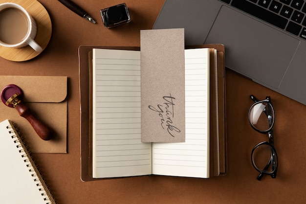 thank you note and laptop above view