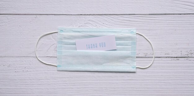 Thank you note on top of medical face mask