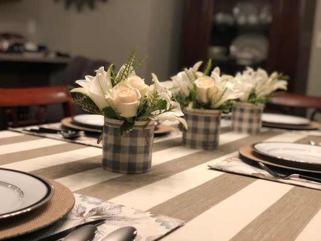 Photo thanksgiving centerpiece with white roses and lilies