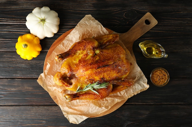 Thanksgiving Day roast turkey on wooden background