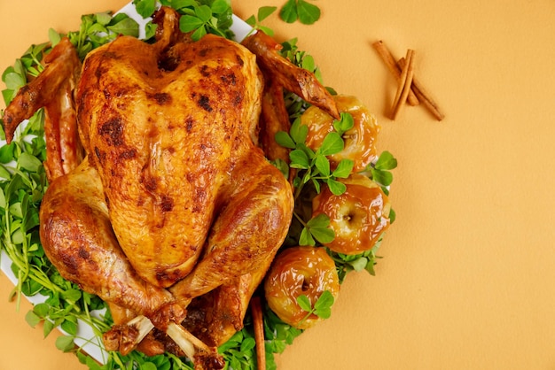 Thanksgiving dinner plate with a close up of delicious baked turkey