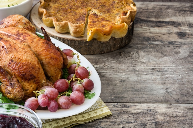 Thanksgiving dinner on rustic wooden. Copy space