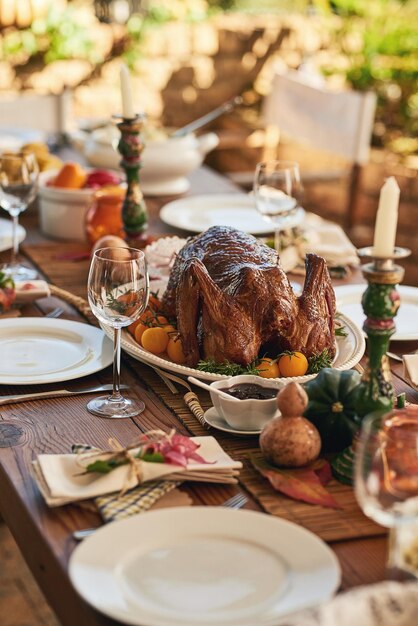 Thanksgiving food and turkey table for gratitude thanks and grace holiday lunch outside Roast vacation and festive outdoor dining meal with colorful decoration for USA celebration