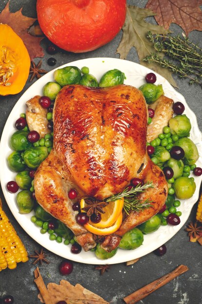 Thanksgiving turkey or chicken for a festive dinner food table background