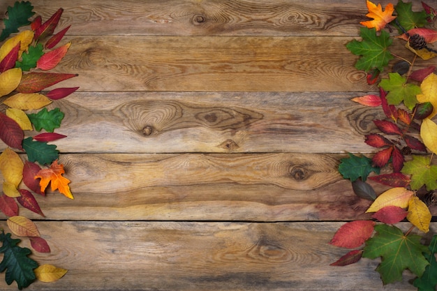 Thanksgiving  with leaves on old wooden table