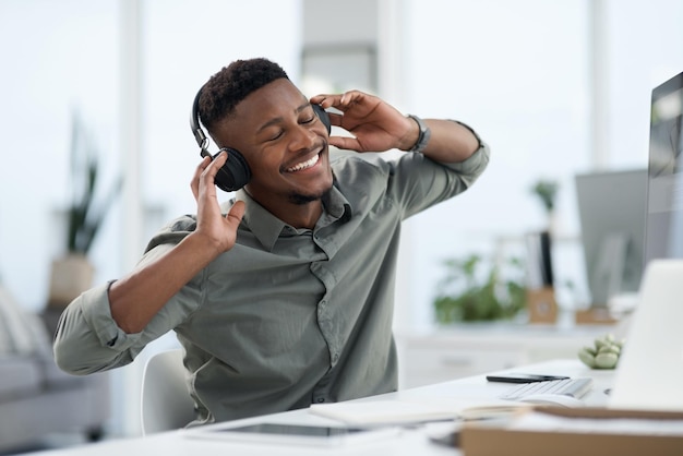 That Friday feeling Shot of a young man on a call at work in a office