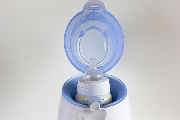 Thawing breast milk in the bottle warmer