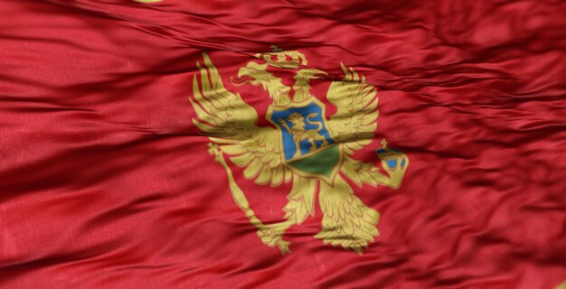 Фото Европейский флаг страны черногории волнистый.