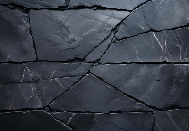 Фото Мраморный шиферный пол имеет текстуру шифра в стиле темно-черного формы полотна