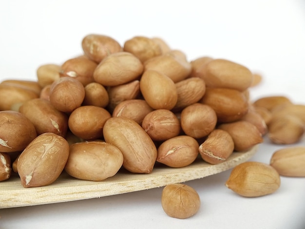 Фото Пищевое содержание арахиса включает в себя ненасыщенные жирные кислоты, белковые волокна, витамин е.