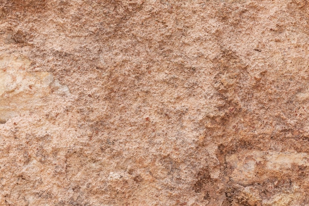 Фото Текстура поверхности натурального камня, крупным планом. строительный материал древних цивилизаций. фон. пробелы для текста.