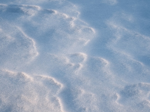 Фото Текстура белого снега, светотени.