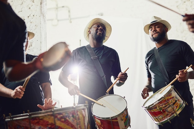 their beats are on a whole new level shot of a group of musical performers playing drums together
