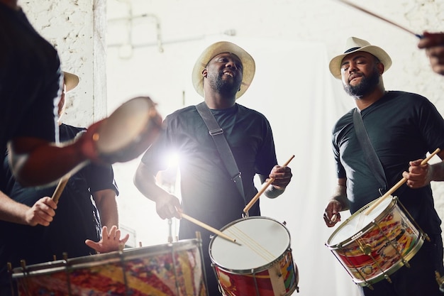 Their beats are on a whole new level Shot of a group of musical performers playing drums together