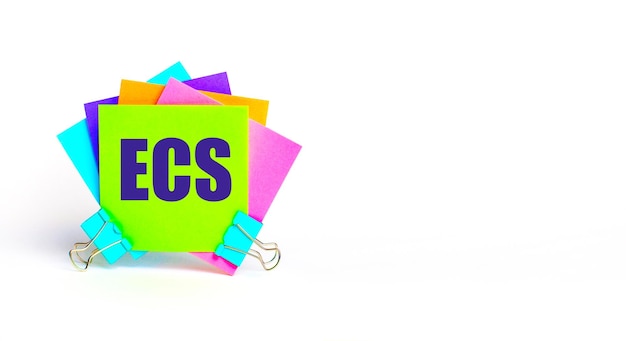 There are bright multicolored stickers with the text ECS Electronic Clearing Service Copy space