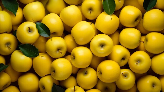 there are many yellow apples with green leaves on them generative ai