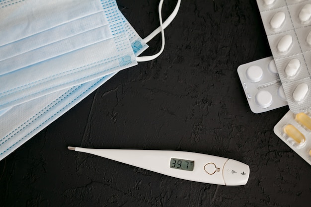 Thermometer, medicines and protective masks