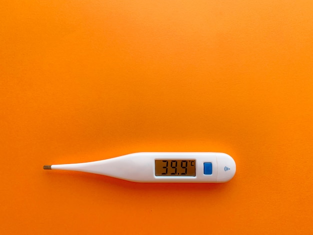 Thermometer in orange table