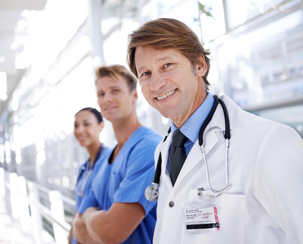 Theyre teamwork saves lives A medical team standing in the hospital corridor