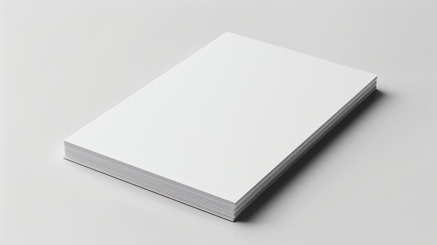 A thick white book sits on a solid white background The book is closed and the spine is facing the camera