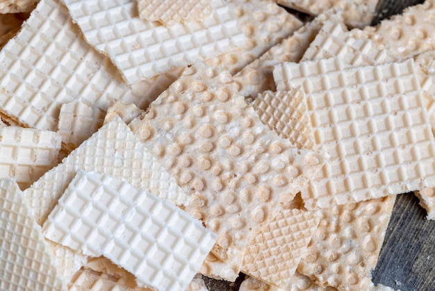 Thin crispy waffles made of wheat flour eggs and sugar thin wheat waffles are a type of dry biscuits that are used to prepare various dishes
