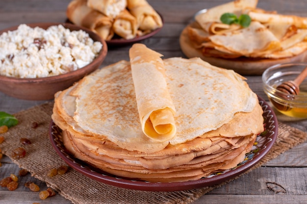 Thin homemade pancakes. Russian bliny. Maslenitsa. Rustic style, close up view