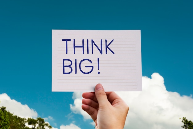 Think big phrase written on a card