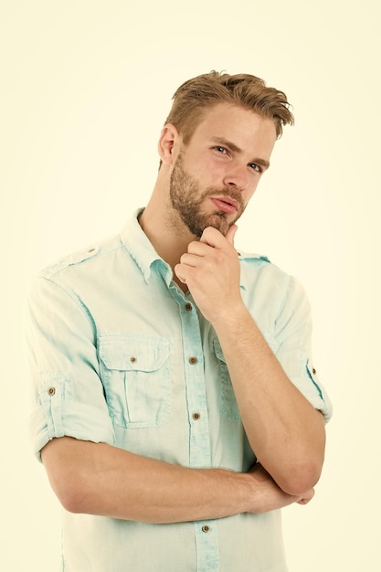 Think to solve Close to solution Man with bristle serious face thinking white background Guy thoughtful touches his chin Thoughtful mood concept Man with beard thinking Think about solution