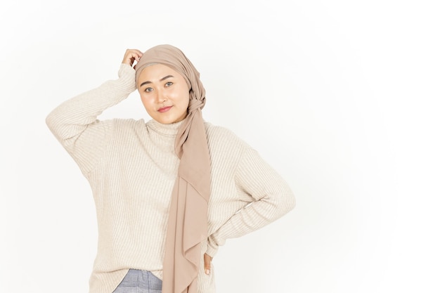 Thinking and confused of Beautiful Asian Woman Wearing Hijab Isolated On White Background